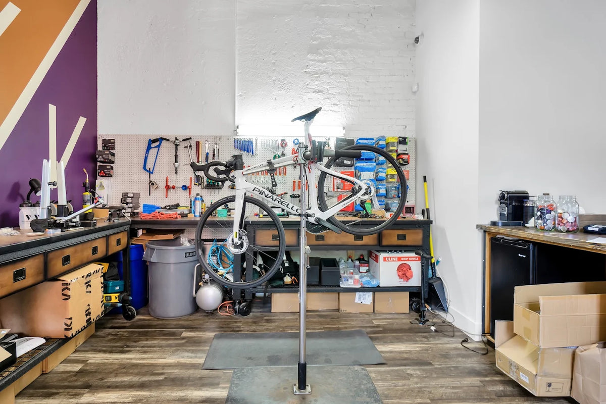 The workshop, with a bike on the stand